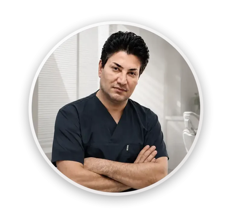 Dr. Hashemi Araghi standing with crossed arms